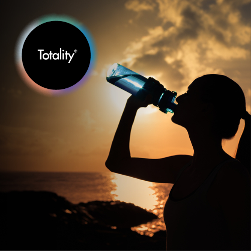 An outline of a woman drinking from a water bottle during sunset with the Borg and Overström Totality emblem