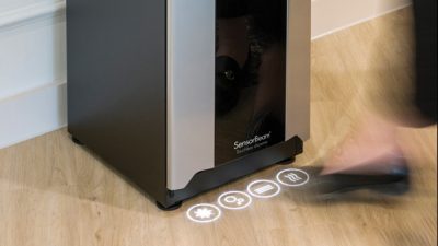 Sensorbeam projection mapped touchless dispense with foot